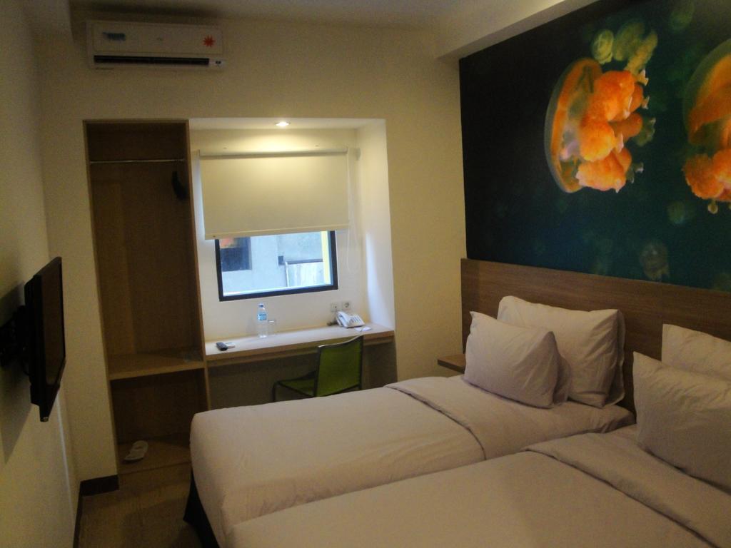 Top Hotel Manado By Gran Puri Quarto foto
