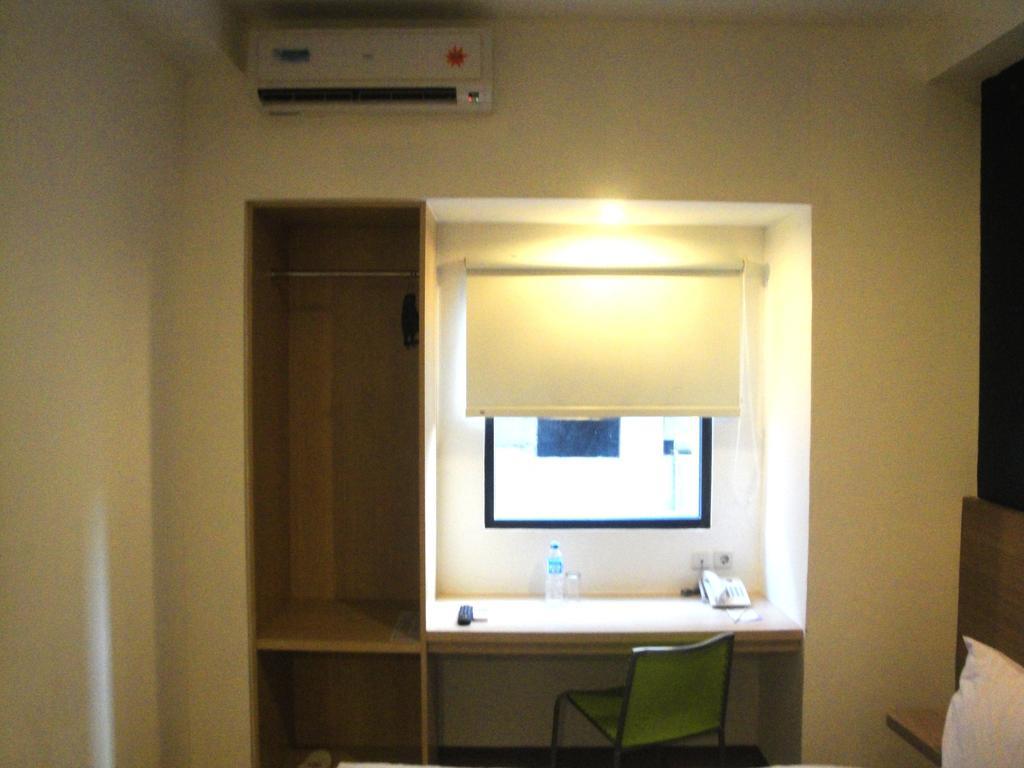 Top Hotel Manado By Gran Puri Quarto foto