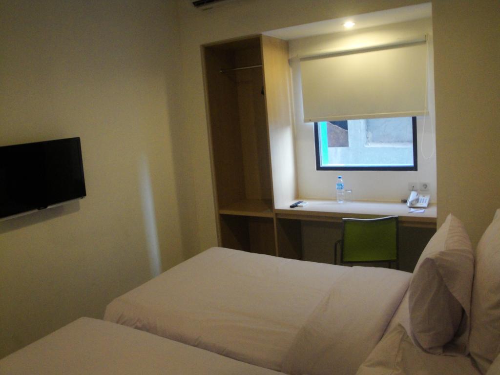 Top Hotel Manado By Gran Puri Quarto foto