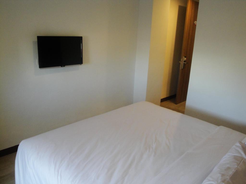 Top Hotel Manado By Gran Puri Quarto foto